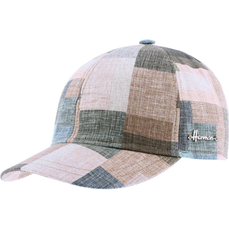 Baseball cap in patchwork fabric with brass clip closing