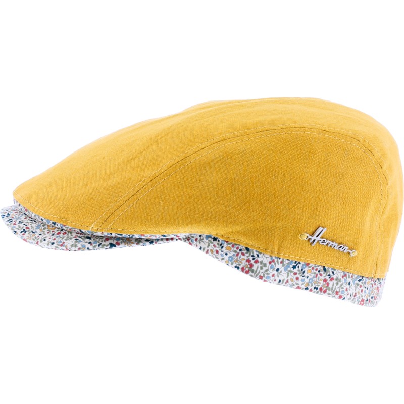 Plain color flat cap with pattern fabric edging and  peak