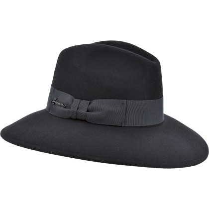 Women's hat with large brim in plain wool felt with fancy decoration.