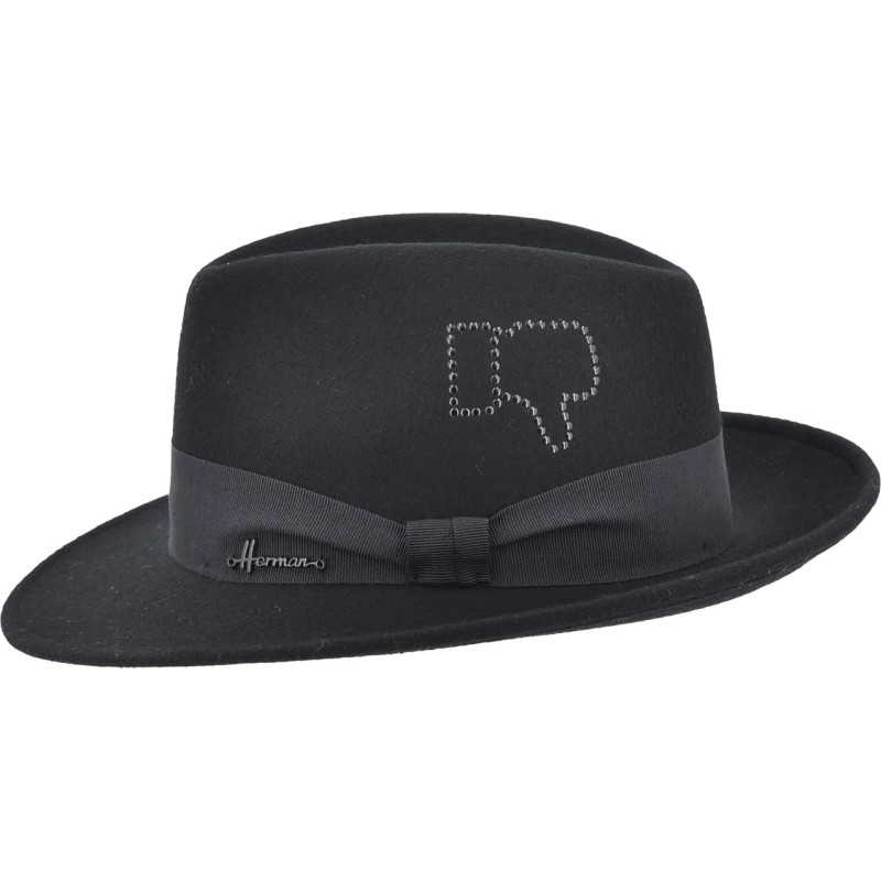 Hat with large raised brim in plain wool felt with metal markings.